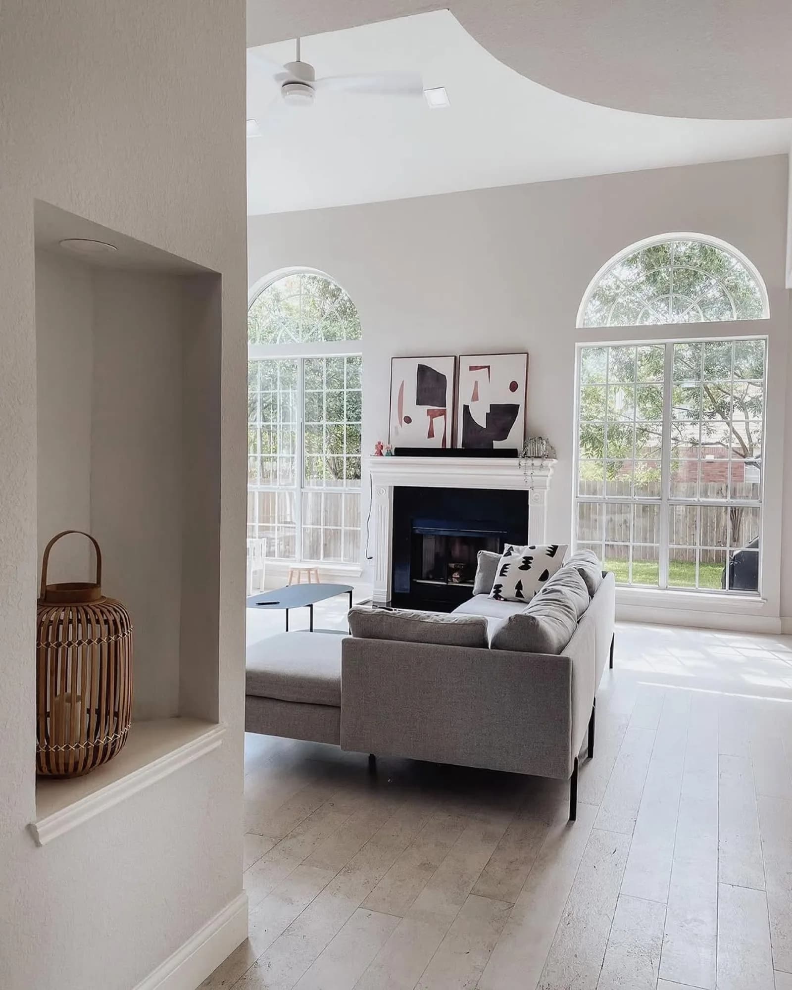 Bright modern living room with arched windows