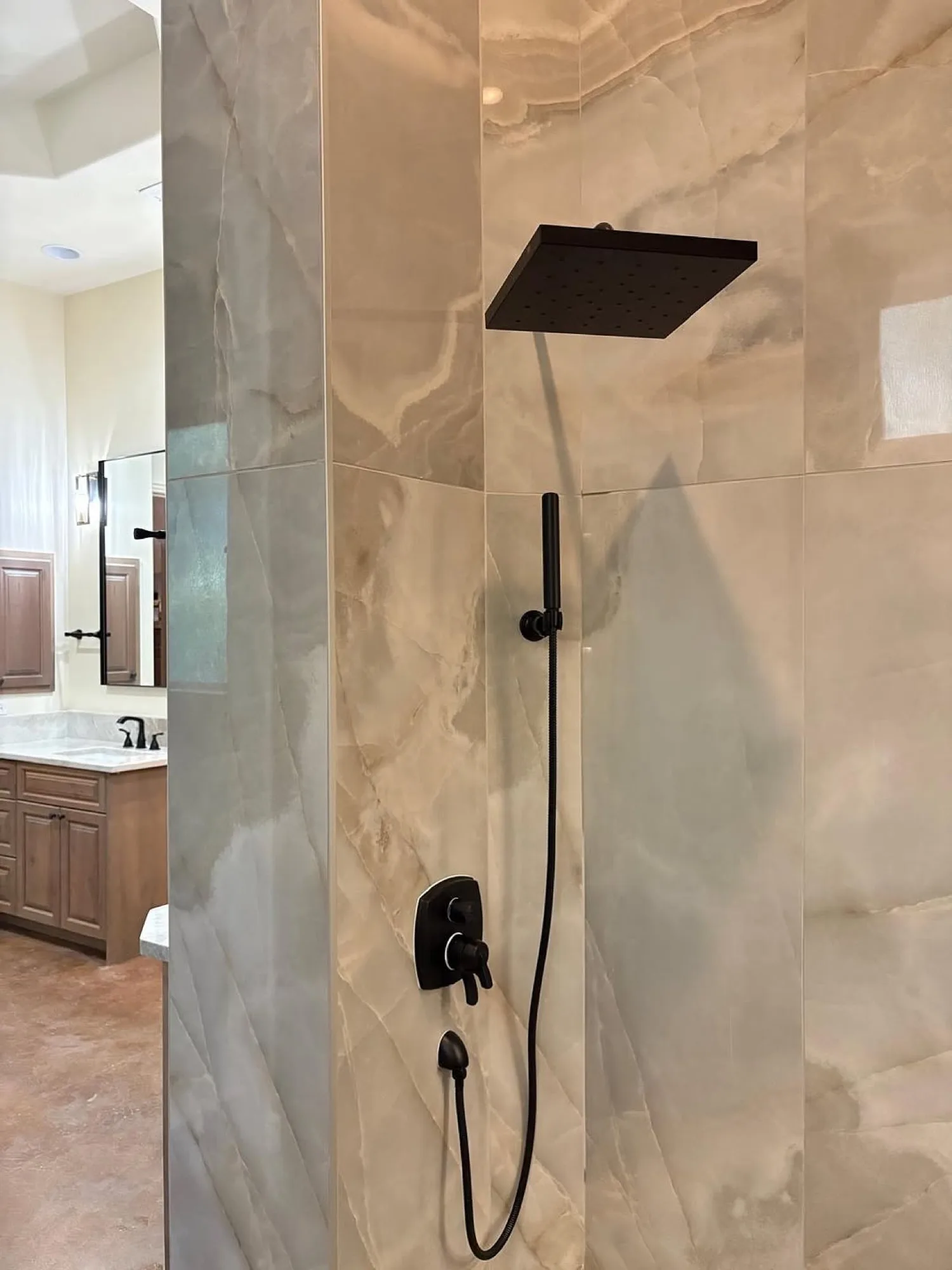 Luxury shower remodel with matte black fixtures